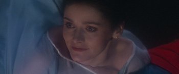 Movie still from “Superman” (1978), directed by Richard Donner – A woman's face in the dark; Close Up shot, Low angle