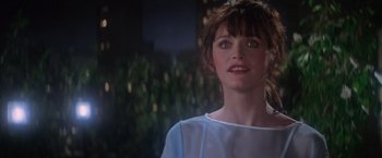 Movie still from “Superman” (1978), directed by Richard Donner – A person wearing a white shirt; Close Up shot, Over the shoulder angle