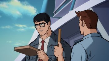 Movie still from “Superman: Man of Tomorrow” (2020), directed by Chris Palmer – A man in a suit and tie holding a book and another man in a suit and tie holding an object; Medium shot, Over the shoulder angle