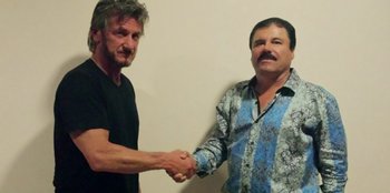 Movie still from “Superpower” (2023), directed by Aaron Kaufman – Two men shaking hands in front of a white wall; Medium shot, Over the shoulder angle