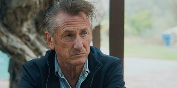 Movie still from “Superpower” (2023), directed by Aaron Kaufman – An older man is looking into the distance; Close Up shot, Over the shoulder angle