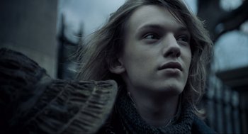 Movie still from “Sweeney Todd: The Demon Barber of Fleet Street” (2007), directed by Tim Burton – A person with long brown hair; Close Up shot, Low angle