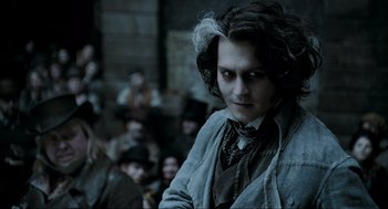 Movie still from “Sweeney Todd: The Demon Barber of Fleet Street” (2007), directed by Tim Burton – Johnny depp as ichabod crane in the movie sleepy hollow; Medium shot, Over the shoulder angle