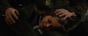 Movie still from “Sweet Girl” (2021), directed by Brian Andrew Mendoza – A woman laying in bed with her head resting on a pillow; Close Up shot, High angle