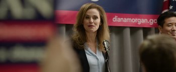 Movie still from “Sweet Girl” (2021), directed by Brian Andrew Mendoza – A person speaking on a microphone; Close Up shot, Over the shoulder angle