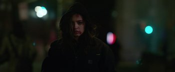 Movie still from “Sweet Girl” (2021), directed by Brian Andrew Mendoza – A woman with blood all over her face; Close Up shot, Low angle