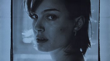 Movie still from “Closer” (2004), directed by Mike Nichols – A woman's face with tears coming out of her eyes; Close Up shot, Low angle
