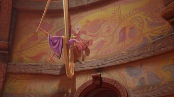 Movie still from “Tangled” (2010), directed by Byron Howard – A woman in a purple dress hanging on a hoop; Wide shot, Low angle