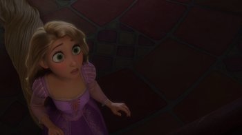 Movie still from “Tangled” (2010), directed by Byron Howard – A young girl in a purple dress looking up; Close Up shot, High angle