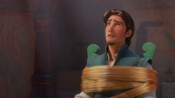 Movie still from “Tangled” (2010), directed by Byron Howard – A man with a beard is tied to a chair; Close Up shot, Low angle