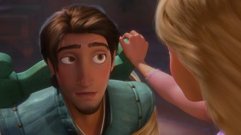 Movie still from “Tangled” (2010), directed by Byron Howard – A man and a woman are looking at each other; Close Up shot, Over the shoulder angle