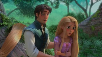 Movie still from “Tangled” (2010), directed by Byron Howard – A man and a woman standing next to each other in front of a forest; Medium shot, Over the shoulder angle