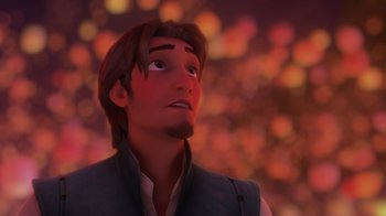 Movie still from “Tangled” (2010), directed by Byron Howard – A man looking up at the sky in a scene from tangled; Close Up shot, Over the shoulder angle