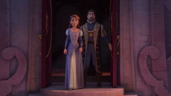 Movie still from “Tangled” (2010), directed by Byron Howard – A man and a woman standing next to each other in front of a doorway; Wide shot, Low angle