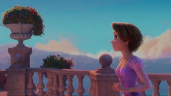 Movie still from “Tangled” (2010), directed by Byron Howard – A young woman standing next to a rapunzel statue; Wide shot, Over the shoulder angle