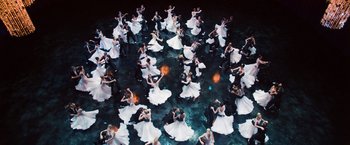 Movie still from “Ted 2” (2015), directed by Seth MacFarlane – A large group of people dancing in a pool of water; Extreme Wide shot, High angle