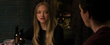 Movie still from “Ted 2” (2015), directed by Seth MacFarlane – A beautiful young lady sitting in front of a window; Close Up shot, Over the shoulder angle