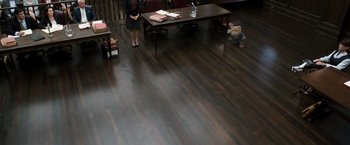 A woman and a small child are sitting at a table