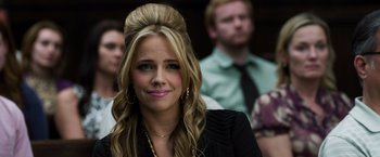 Movie still from “Ted 2” (2015), directed by Seth MacFarlane – A woman in a black jacket and a man in a green shirt; Close Up shot, Over the shoulder angle