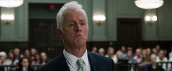 Movie still from “Ted 2” (2015), directed by Seth MacFarlane – An older man in a suit and a tie; Close Up shot, Low angle