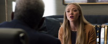 Movie still from “Ted 2” (2015), directed by Seth MacFarlane – A young woman talking to an older man in front of a couch; Close Up shot, Over the shoulder angle