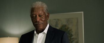 Movie still from “Ted 2” (2015), directed by Seth MacFarlane – An older man in a white shirt and a black suit; Close Up shot, Low angle