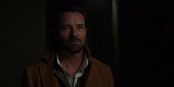 Movie still from “Teen Wolf: The Movie” (2023), directed by Russell Mulcahy – A person wearing a jacket; Close Up shot, Over the shoulder angle