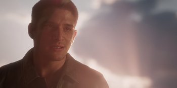 Movie still from “Teen Wolf: The Movie” (2023), directed by Russell Mulcahy – A person wearing a jacket; Close Up shot, Over the shoulder angle