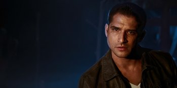 Movie still from “Teen Wolf: The Movie” (2023), directed by Russell Mulcahy – A person wearing a leather jacket; Close Up shot, Low angle