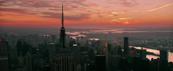 Movie still from “Teenage Mutant Ninja Turtles” (2014), directed by Jonathan Liebesman – A view of a city at sunset from the top of a skyscraper; Extreme Wide shot, High angle