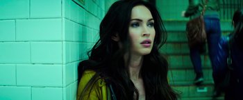 Movie still from “Teenage Mutant Ninja Turtles” (2014), directed by Jonathan Liebesman – A person with long black hair; Close Up shot, Low angle