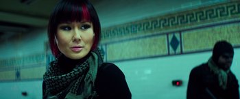 Movie still from “Teenage Mutant Ninja Turtles” (2014), directed by Jonathan Liebesman – A person wearing a scarf; Close Up shot, Over the shoulder angle