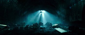 Movie still from “Teenage Mutant Ninja Turtles” (2014), directed by Jonathan Liebesman – The light is shining through a tunnel in the dark; Extreme Wide shot, Low angle