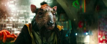 Movie still from “Teenage Mutant Ninja Turtles” (2014), directed by Jonathan Liebesman – The face of a man wearing a boar's head mask; Close Up shot, Overhead angle