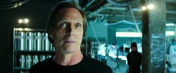 Movie still from “Teenage Mutant Ninja Turtles” (2014), directed by Jonathan Liebesman – A person wearing a black t - shirt; Close Up shot, Low angle