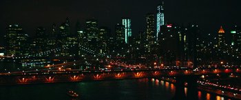 Movie still from “Teenage Mutant Ninja Turtles” (2014), directed by Jonathan Liebesman – A view of a city at night from across a bridge; Extreme Wide shot, High angle