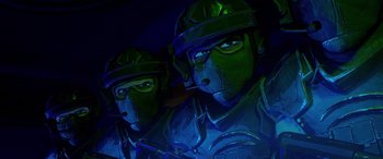 Movie still from “Teenage Mutant Ninja Turtles: Mutant Mayhem” (2023), directed by Jeff Rowe – View of a couple of people wearing helmets; Close Up shot, Low angle