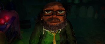 Movie still from “Teenage Mutant Ninja Turtles: Mutant Mayhem” (2023), directed by Jeff Rowe – An image of a man with a beard wearing glasses; Close Up shot, High angle