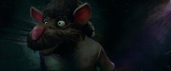 Movie still from “Teenage Mutant Ninja Turtles: Mutant Mayhem” (2023), directed by Jeff Rowe – A rat's face in the dark; Close Up shot, High angle