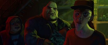Movie still from “Teenage Mutant Ninja Turtles: Mutant Mayhem” (2023), directed by Jeff Rowe – An animated picture of a man and a woman; Medium shot, Low angle