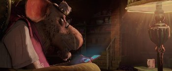 Movie still from “Teenage Mutant Ninja Turtles: Mutant Mayhem” (2023), directed by Jeff Rowe – An animated bear is holding a tablet in his hand; Medium shot, Low angle