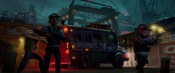 Movie still from “Teenage Mutant Ninja Turtles: Mutant Mayhem” (2023), directed by Jeff Rowe – An image of a man standing in front of a truck; Wide shot, Low angle