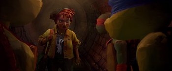 Movie still from “Teenage Mutant Ninja Turtles: Mutant Mayhem” (2023), directed by Jeff Rowe – A man with a red dreadlocks standing in front of a clown; Medium shot, Over the shoulder angle