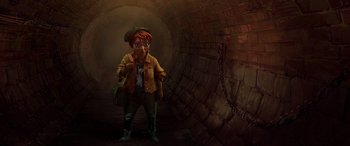 Movie still from “Teenage Mutant Ninja Turtles: Mutant Mayhem” (2023), directed by Jeff Rowe – A person standing in a tunnel with chains around their neck; Wide shot, High angle