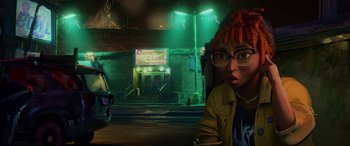 Movie still from “Teenage Mutant Ninja Turtles: Mutant Mayhem” (2023), directed by Jeff Rowe – A woman with red hair sitting at a table in front of a building; Medium shot, High angle