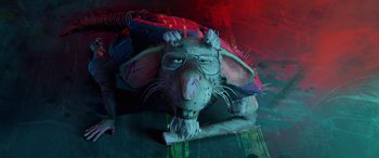 Movie still from “Teenage Mutant Ninja Turtles: Mutant Mayhem” (2023), directed by Jeff Rowe – A rat with glasses is sitting on a piece of paper; Close Up shot, Overhead angle