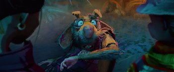 Movie still from “Teenage Mutant Ninja Turtles: Mutant Mayhem” (2023), directed by Jeff Rowe – An animated rat wearing glasses and holding a branch; Close Up shot, High angle