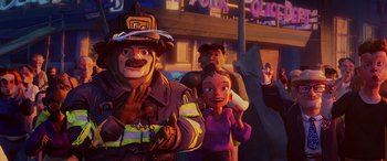 Movie still from “Teenage Mutant Ninja Turtles: Mutant Mayhem” (2023), directed by Jeff Rowe – A group of people standing next to each other in front of a building; Medium shot, Over the shoulder angle