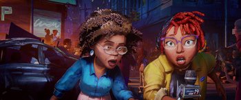 Movie still from “Teenage Mutant Ninja Turtles: Mutant Mayhem” (2023), directed by Jeff Rowe – An image of a woman with a surprised look on her face; Close Up shot, Low angle