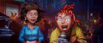 Movie still from “Teenage Mutant Ninja Turtles: Mutant Mayhem” (2023), directed by Jeff Rowe – Two women are sitting next to each other in front of a microphone; Close Up shot, Low angle